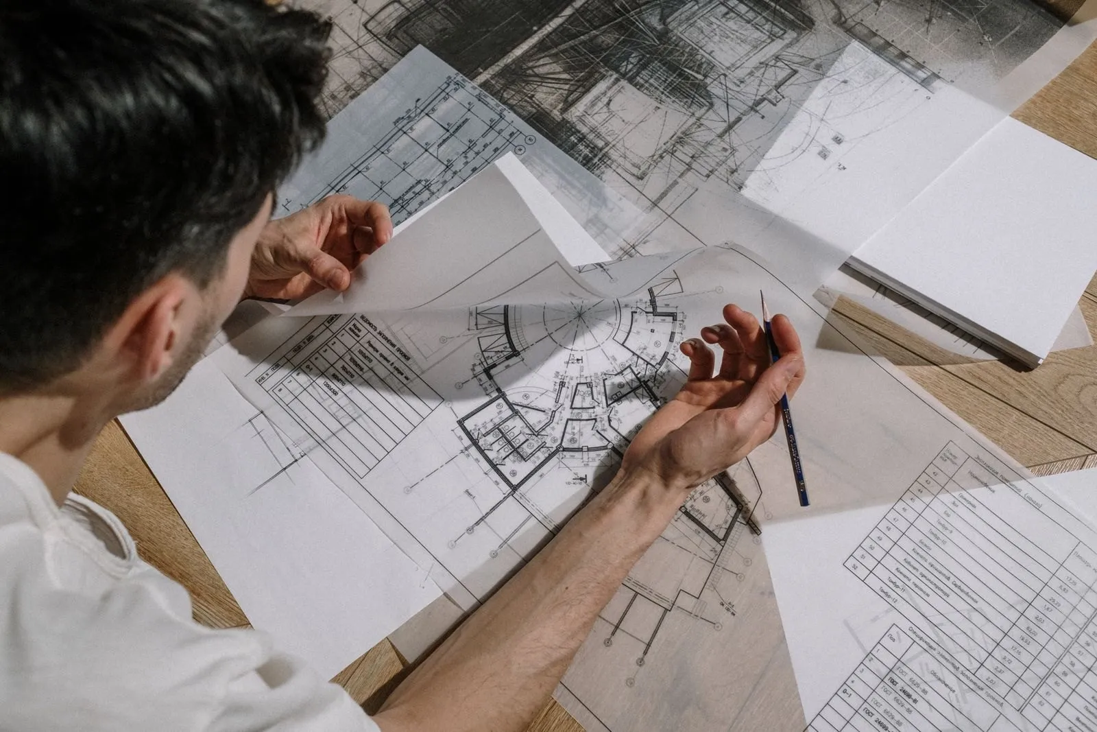 Engineer marking up technical drawings